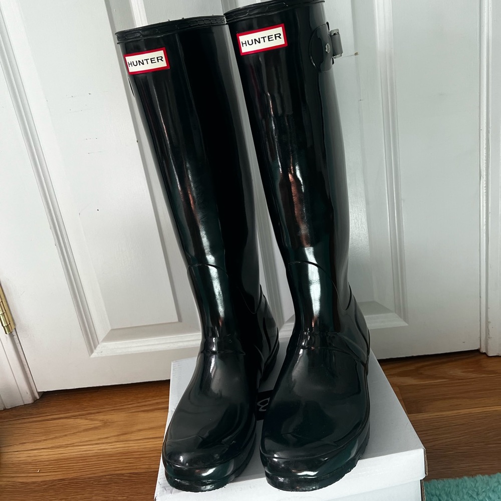 Tall black hunter rain boots